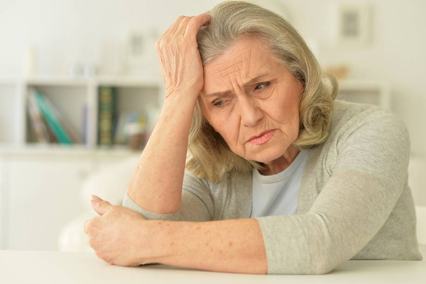 Close up portrait of sad senior woman at home  - Foto, imagen