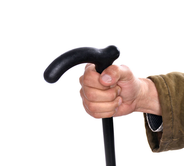 Hand of an old man holding a cane - Fotoğraf, Görsel