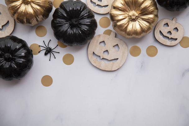 Halloween luxury gold and black pumpkin flat lay background composition - Фото, зображення