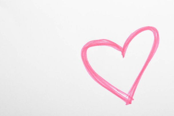 Pink heart drawn on white paper, top view - Fotoğraf, Görsel