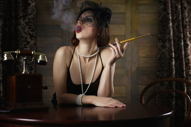 Beautiful 1930s girl smokes - Foto, immagini
