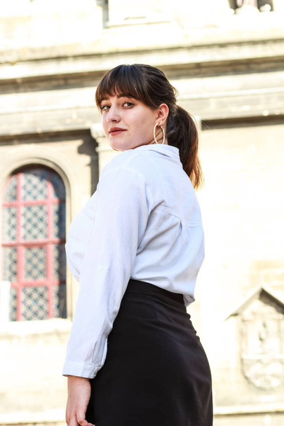 Business lady.Fashion woman. White shirt, black skirt. Backgroun - Fotoğraf, Görsel