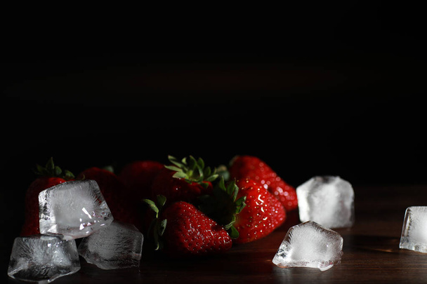 Fresh ripe strawberries on a wooden table - Photo, Image