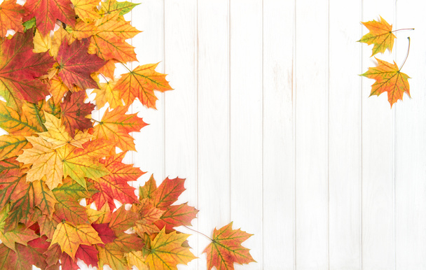 Maple leaves wooden texture Autumn floral background - Фото, изображение