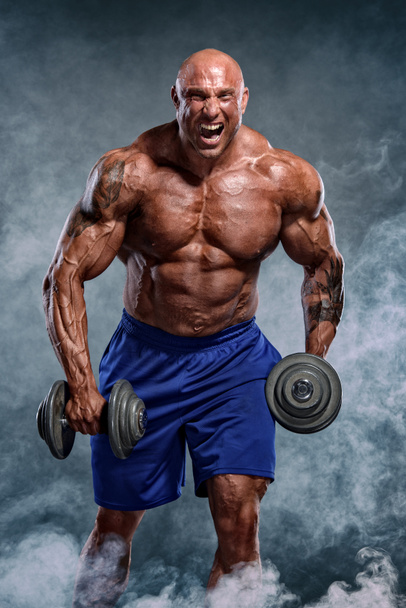 Hard Core Bodybuilding. Bodybuilder Lifting Weights - Photo, Image