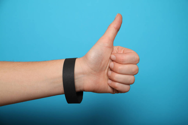Concert wristband mockup, black hospital bracelet design. Arm ad - Foto, imagen