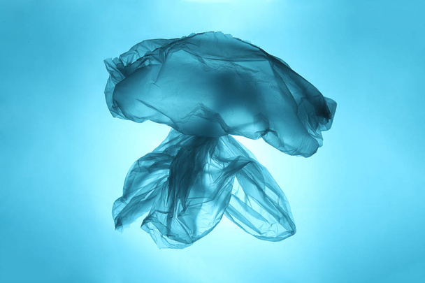 Sea and ocean life from waste. Plastic bag in the form of a jellyfish. Pollution of the planet. - Foto, immagini