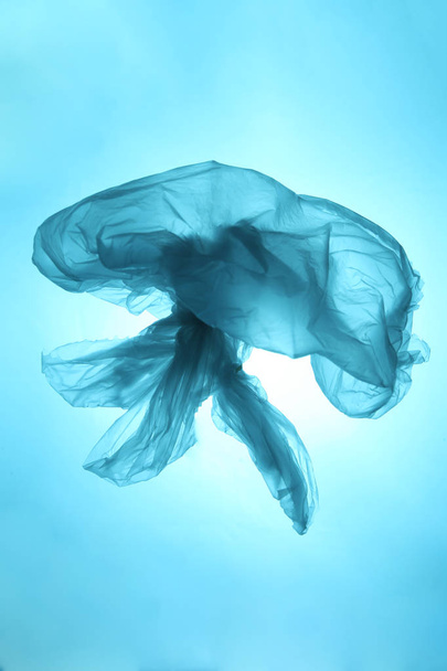 Marine debris, ocean pollution. Plastic bags are killing the world. Used plastic bag in the form of a jellyfish. - Foto, Imagem