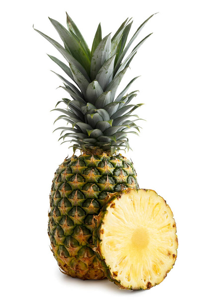 Whole pineapple isolated standing on white. - Fotografie, Obrázek