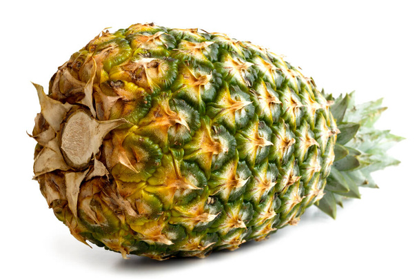 Whole pineapple isolated lying down on white. - Foto, immagini