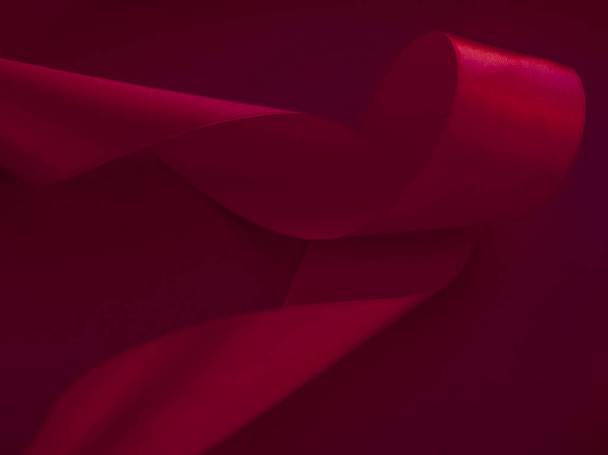 Абстрактна фігурна шовкова стрічка на фоні вина, ексклюзивна розкіш
  - Фото, зображення