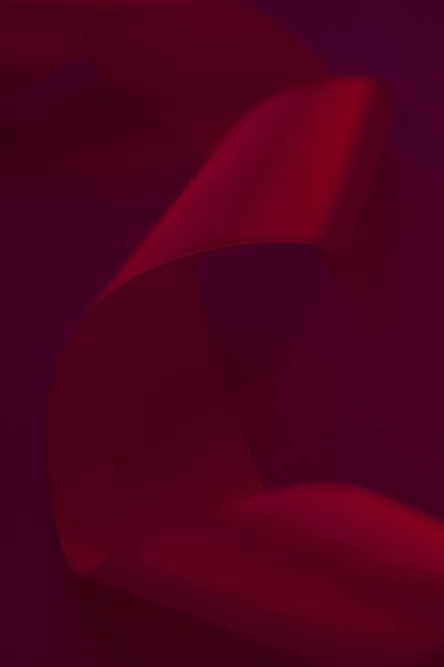Абстрактна фігурна шовкова стрічка на фоні вина, ексклюзивна розкіш
  - Фото, зображення