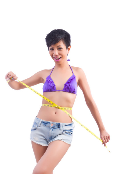 Mujer en bikini en concepto de dieta
 - Foto, imagen