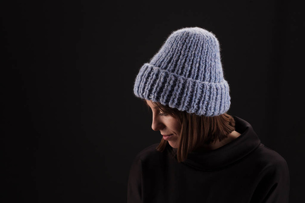 Lovely woman in warm knit hat  - Valokuva, kuva