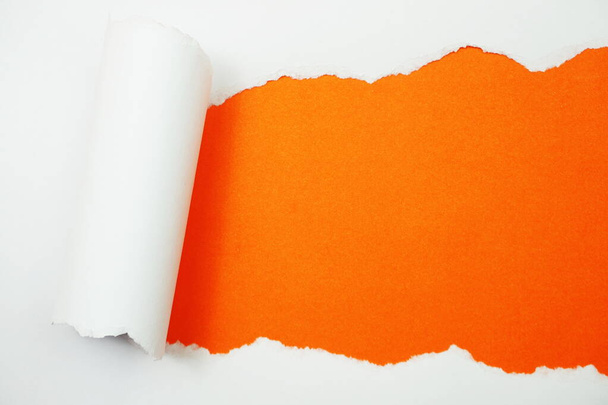 Paper torn with space copy on orange background - Foto, imagen