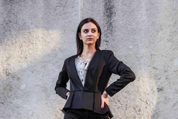 Black haired girl.Business woman in black classic suit.White blo - Foto, Imagem