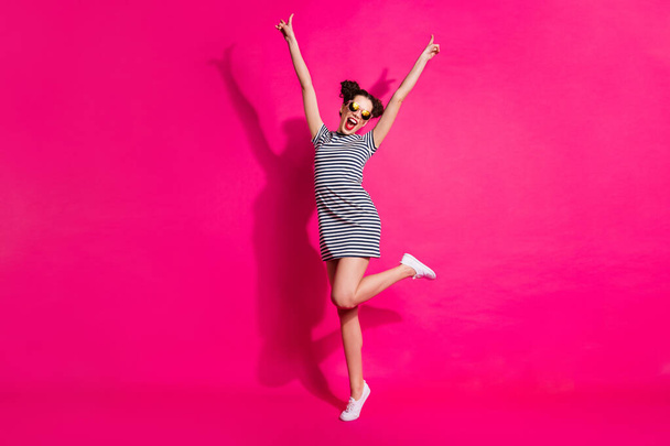 Full length body size view of her she nice attractive lovely cheerful cheery girl dancing having fun rising hands up isolated over bright vivid shine vibrant pink fuchsia color background - Fotó, kép