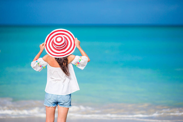 Caucasian girl with hat background the sea - Photo, Image