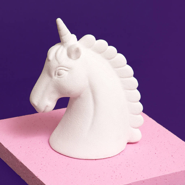 White unicorn in geometry space. Minimal creative art - Photo, image