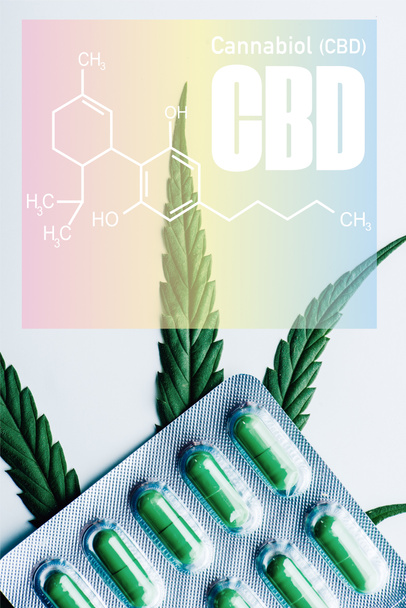 top view of green pills in blister and marijuana leaf on white background with cbd molecule illustration - Foto, afbeelding