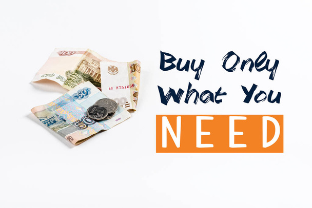 russian money on white background with buy only what you need illustration - Фото, зображення