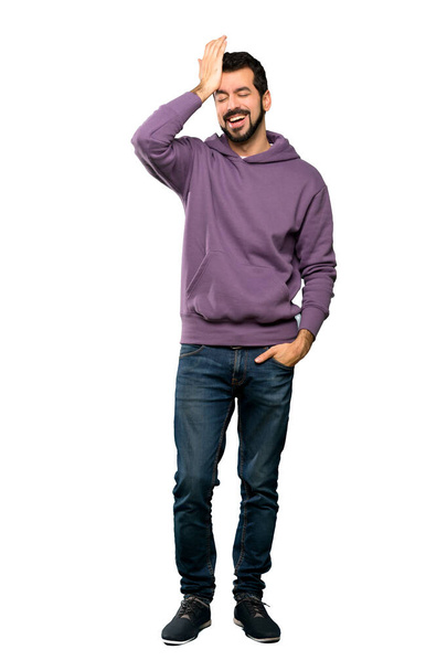 Full-length shot of Handsome man with sweatshirt has realized something and intending the solution over isolated white background - Photo, image