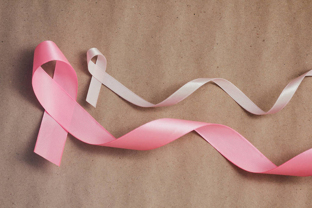 Pink ribbon. Symbol of breast cancer awareness. Health care conception. Preventive measures. October checking time. - Fotografie, Obrázek
