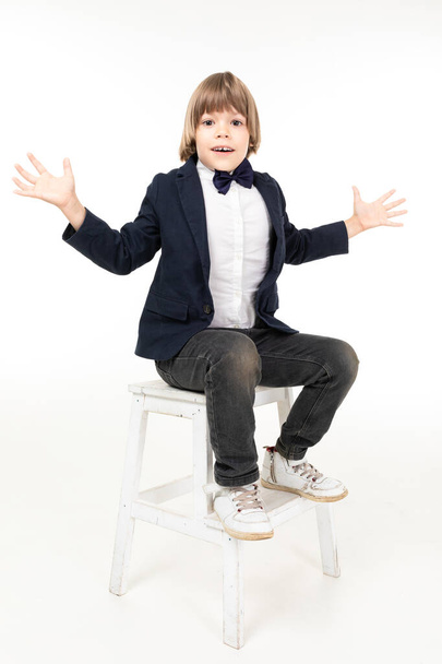 cute elegant little boy posing in studio - Фото, изображение