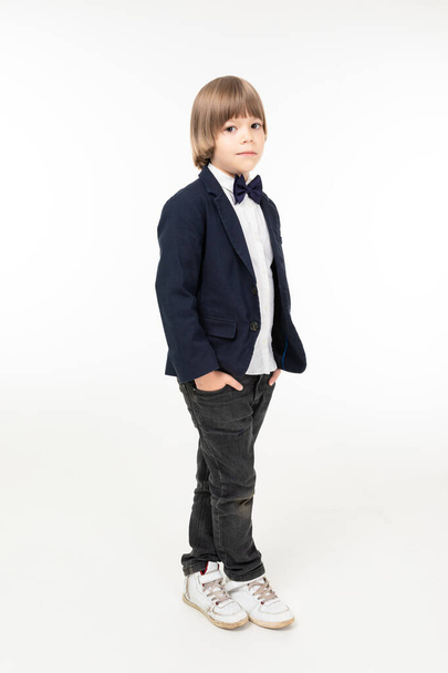 cute elegant little boy posing in studio - Φωτογραφία, εικόνα