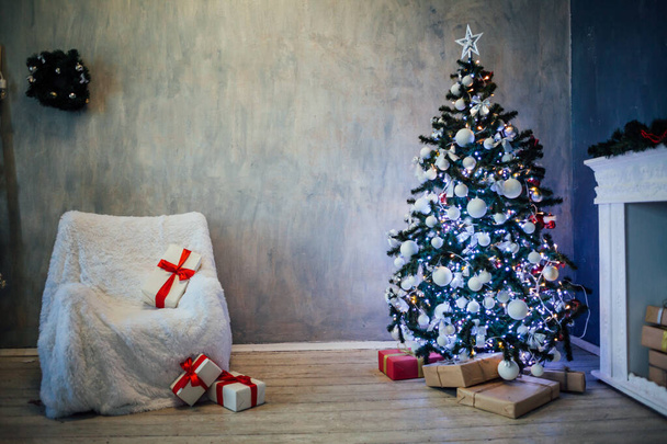 Christmas tree with presents, Garland lights new year 2018 2019 - 写真・画像