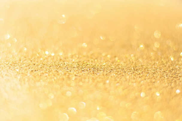 Keskittynyt kulta glitter tausta. Kulta abstrakti bokeh backgroun
 - Valokuva, kuva