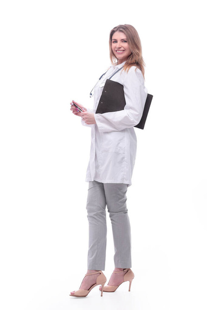 female doctor with clipboard. isolated on white - Foto, afbeelding