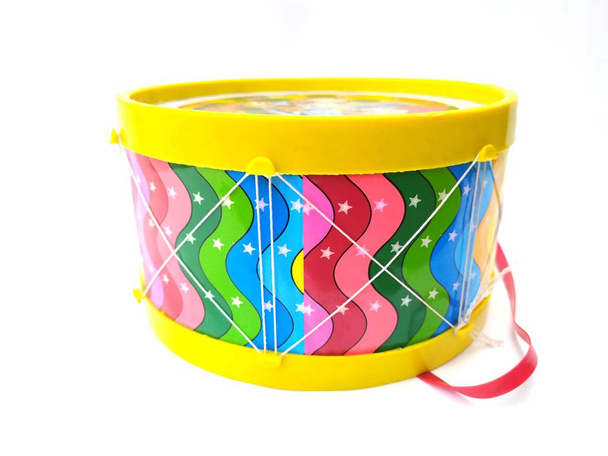 colorful children playing plastic drum isolated on white background - Photo, Image