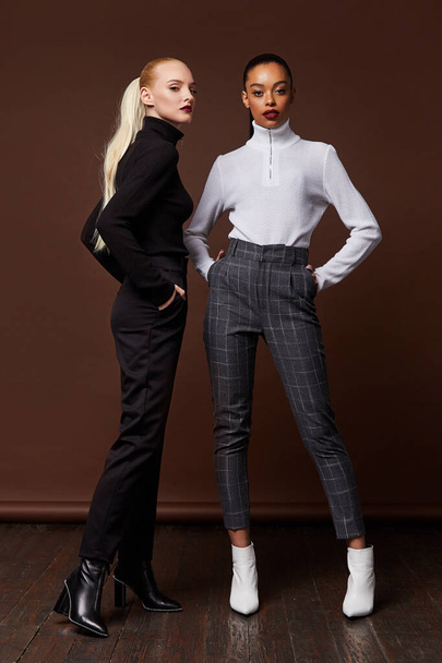 Two beautiful sexy woman long brunette blond hair glamour model  - Valokuva, kuva