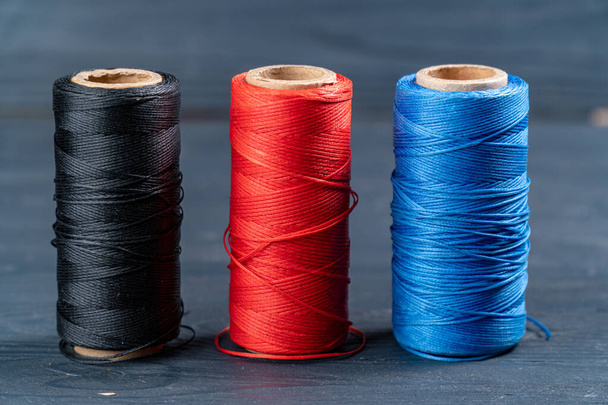 thread coils black red and blue - Photo, Image
