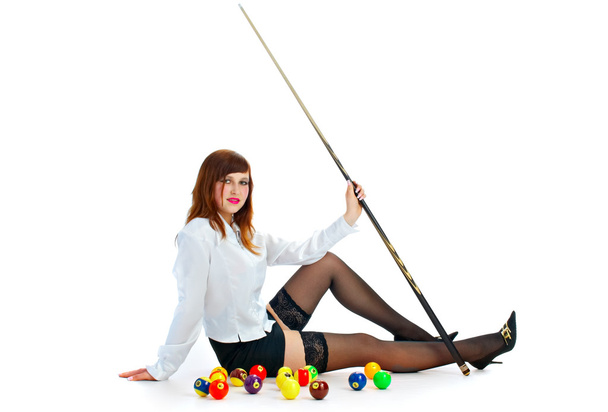 Brunette with cue and billiard ball - Zdjęcie, obraz
