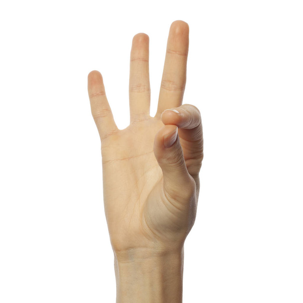 Finger spelling number 9 in American Sign Language on white background. ASL concept - 写真・画像