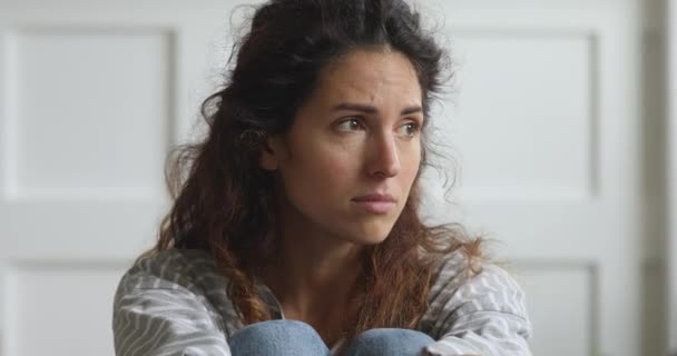 Unhappy thoughtful young woman sad face thinking of problem - Footage, Video