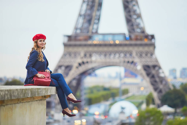 Young woman with long blond curly hair in Paris, France - 写真・画像