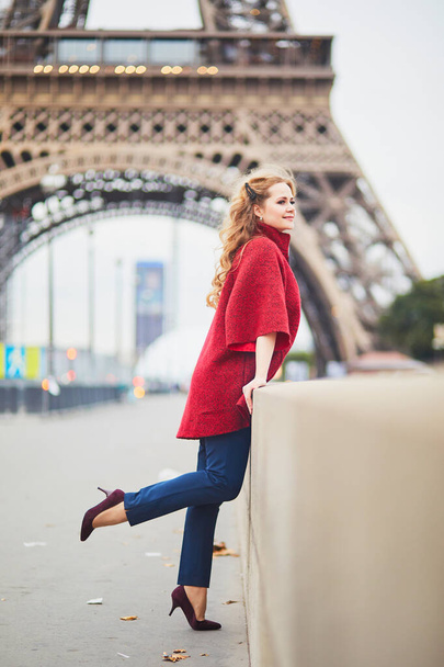 Young woman with long blond curly hair in Paris, France - 写真・画像