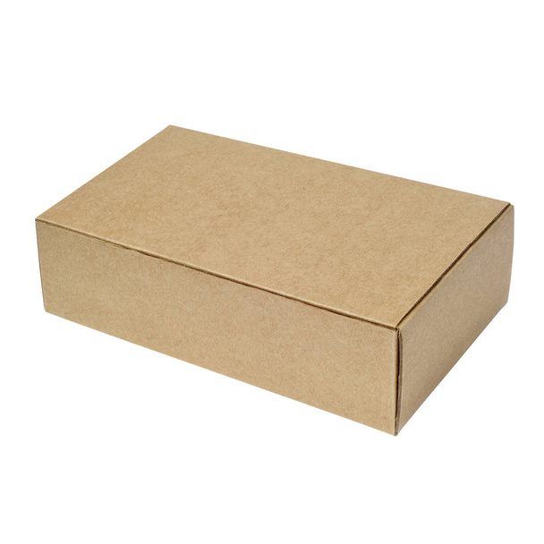 kartonnen doos geïsoleerd op een witte achtergrond  - Foto, afbeelding