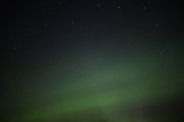 Northern lights and bright stars in the night - Photo, Image