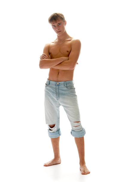 Lad in jeans - Фото, изображение