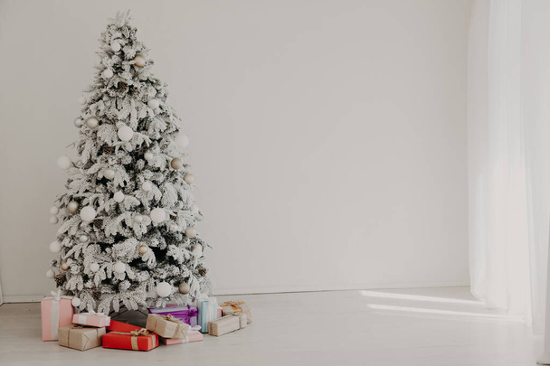 happy holidays Christmas new year tree gifts Interior white room - Photo, Image