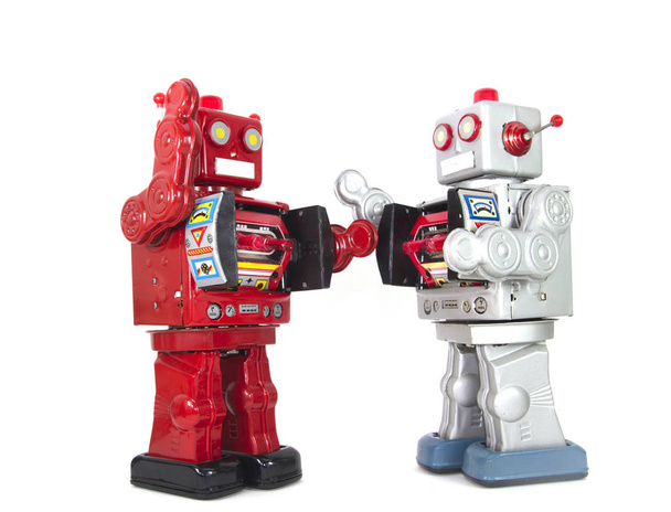 deux robots rétro haut cinq l'un l'autre isolé
 - Photo, image