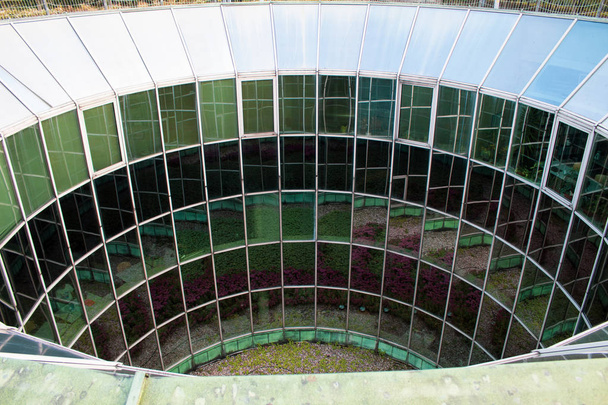 Glass funnel with cylindrical windows in architecture. - Photo, Image