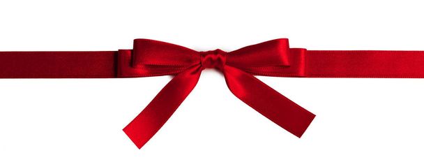 Arco de regalo rojo en blanco
 - Foto, imagen