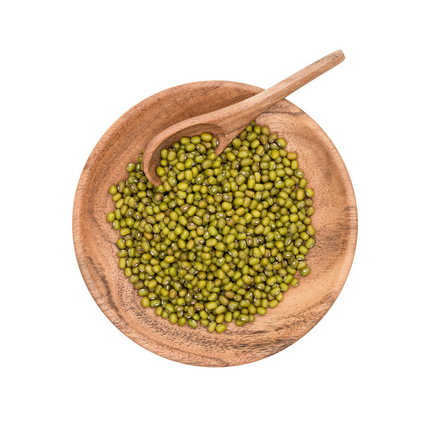 Wooden plate with mung beans - Photo, Image