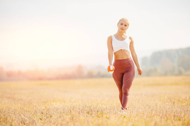 Young blond fitness woman runner athlete running park Sunrise - Zdjęcie, obraz