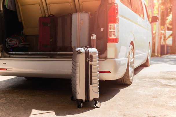 Carry-on luggage bag in mini bus travel concept. - Zdjęcie, obraz